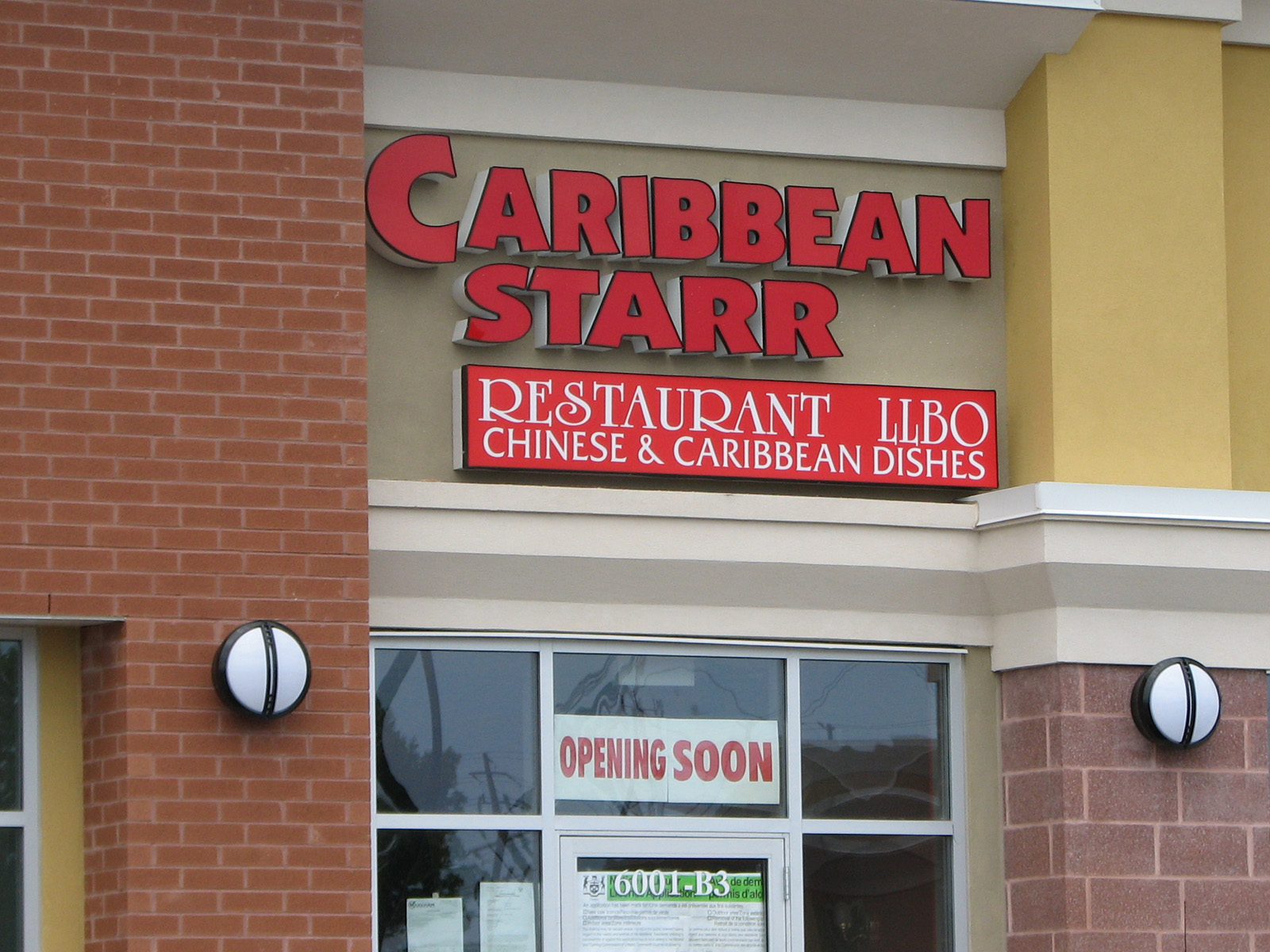 Storefront signs and signage in Scarborough and Toronto by LETTERING deSigns on Midland Ave.